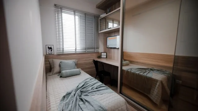 small bedroom with desk